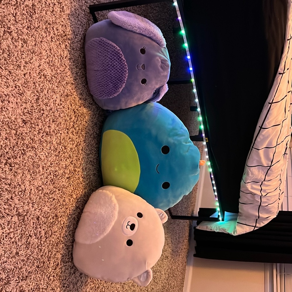 Squishmallows! 1 large dinosaur and a smaller bunny and polar bear.